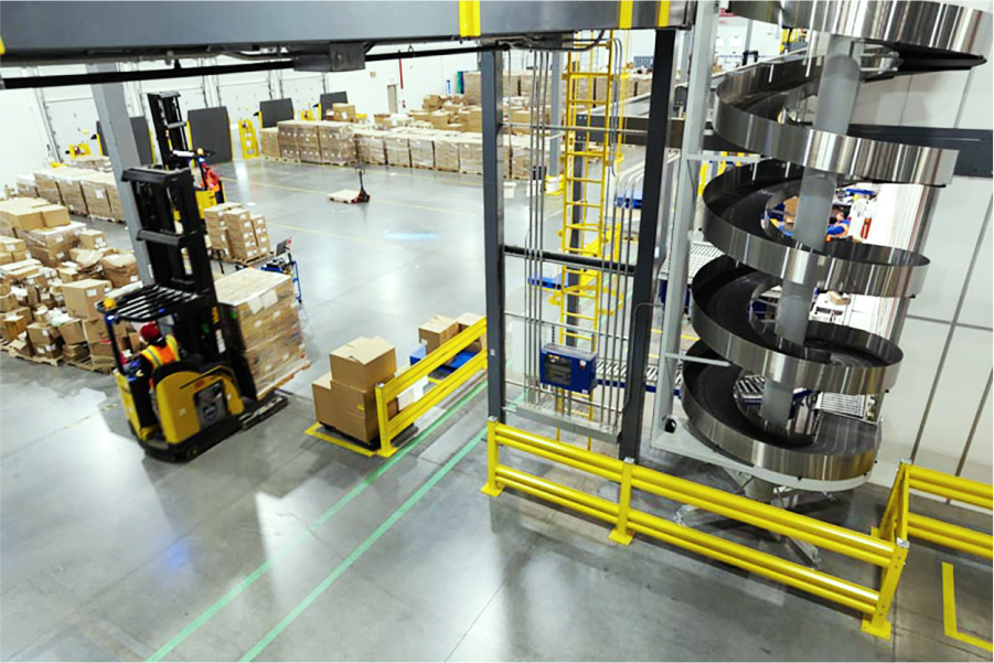 Wide view of an employee using a forklift in a Ryder wholesale fulfillment facility